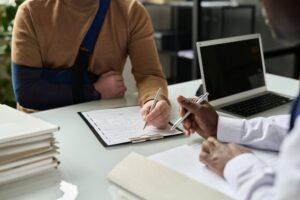 Undocumented worker injury lawyer meets with clients and explains how they can help.