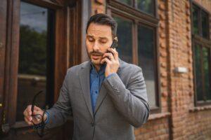 A personal injury attorney picks up the phone and answers his client, who asks, “Can I sue both the trucking company and the driver after an accident?”