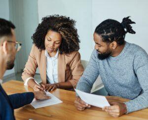 An attorney meets with his clients, who ask, “How much compensation can I get after a bicycle accident in NY?”