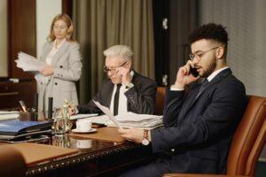 An attorney answers the phone and speaks to a personal injury victim about the steps to take after a motorcycle accident in New York.